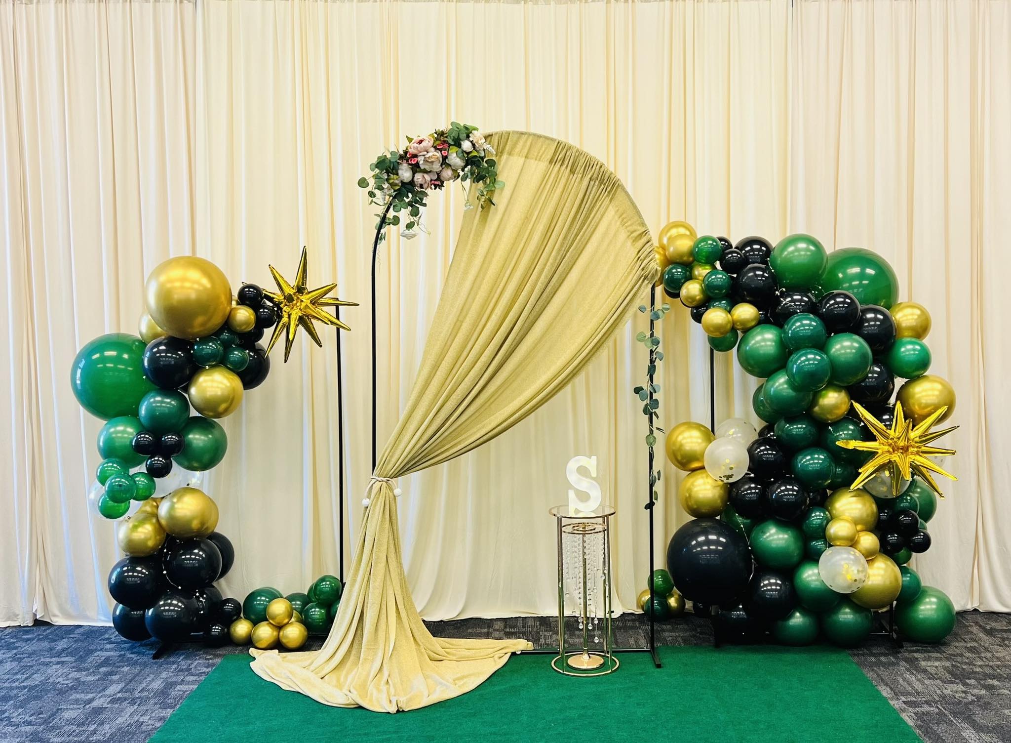 Green and Black Balloon Arch